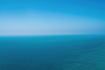 Fototapeta premium Azure skyline where the clear sky meets the endless ocean