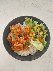 Sweet and Sour Chicken with Rice and Vegetables