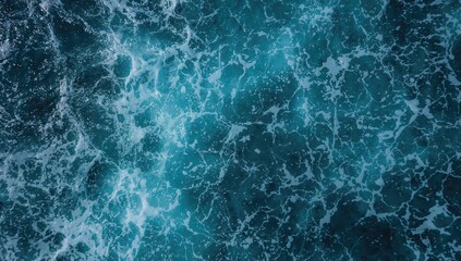 Abstract blue ocean backdrop with white waves