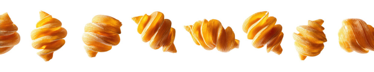 Several golden-brown,  ridged,  pasta-like dumplings/ravioli