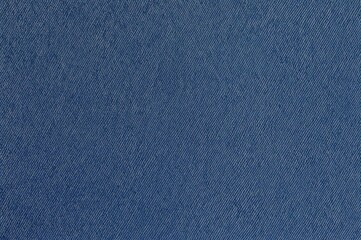 Denim textile backdrop featuring patterns and textures with a vintage, retro, and grunge style