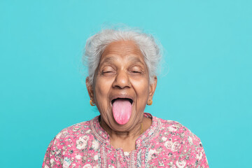 Portrait of senior Indian woman sticking out tongue. AI generative art