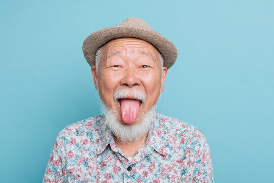 Portrait of senior Asian man sticking out tongue. AI generative art