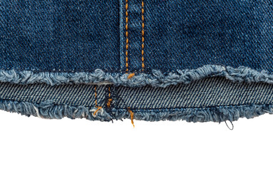 Piece of torn denim on a white background. Denim texture