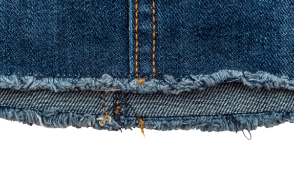 Piece of torn denim on a white background. Denim texture