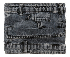 Piece of torn denim on a white background. Denim texture