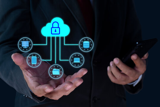 Businessman holding virtual cloud computing with connection line. Cloud computing is system for sharing download and upload big data information. Cloud technology and Data storage concept.
