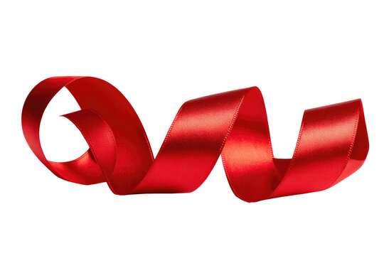 A vibrant, glossy red ribbon curls in a spiral, against a stark black background. The ribbon's smooth, satin-like texture is highlighted - Powered by Adobe