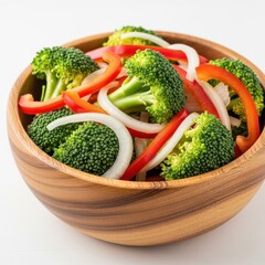 Fresh broccoli and red pepper salad in a wooden bowl
