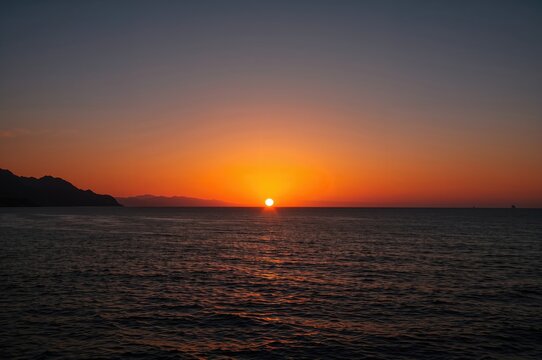 Stunning evening by the seaside with vibrant sky and natural scenery