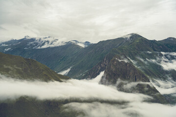 Scenic dramatic landscape of the Andes Mountains captured from the Chicaqata Hike leading to the Inti Punku Sun Gate near Ollantaytambo, Peru.