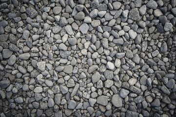 Abstract pattern of tiny gray gravel stones, texture for design and nature themes