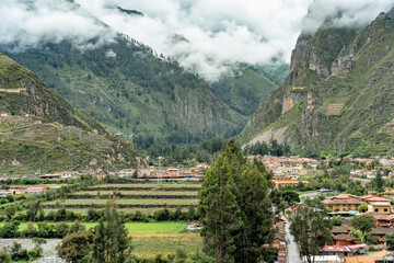 Scenic landscape view from above with Ollantaytambo town, in the Sacred Valley of the Incas, Peru