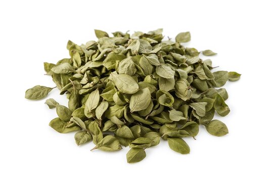 Pile of fresh and dried Calea zacatechichi leaves on a white surface. Dream clarity theme.