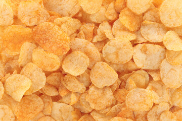 Background made of potato chips, full focus stacking for sharp texture, crisp detail and golden...