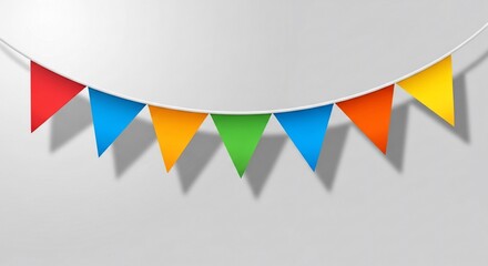 Colorful Triangular Bunting Flags Hanging on a White String Against a Gray Background