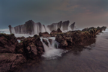 Obraz premium Sunset in Tanjung Layar Beach