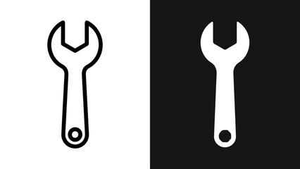 Monochrome Wrench Icon Duo on Contrasting Black and White Backgrounds
