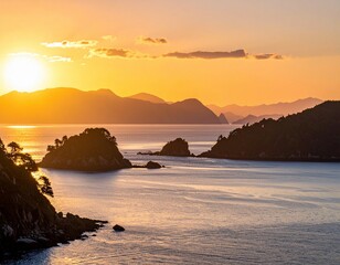 Fototapeta premium Breathtaking golden hour sunrise over a tranquil sea, with silhouetted islands and mountains creating a serene coastal landscape
