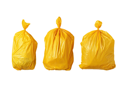 Three yellow plastic garbage bags of varying fullness, set against a black background