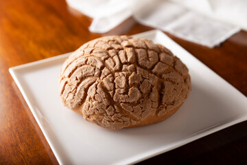 Conchas. Mexican sweet bread roll with seashell-like appearance, Usually eaten with coffee or hot chocolate at breakfast or as an afternoon snack.
