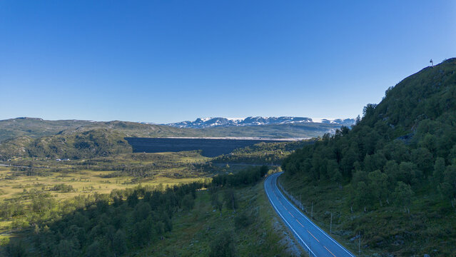 Aerial View of Hardangervidda Dam and Mountain Road in the Norwegian Highlands