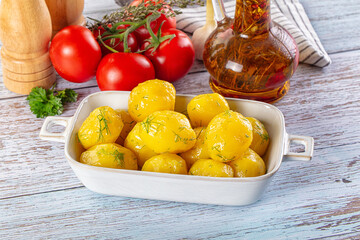 Boiled young potato with oil