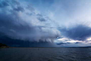 Storm clouds forming over the water of the Albufera de Valencia