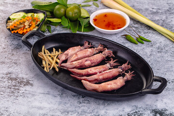 Boiled wild mini calamari snack