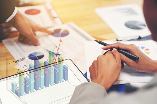 Business Team Analyzing Investment Data. Growth and Investment Strategy Meeting