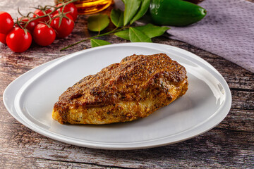 Baked chicken breast with spices and herbs