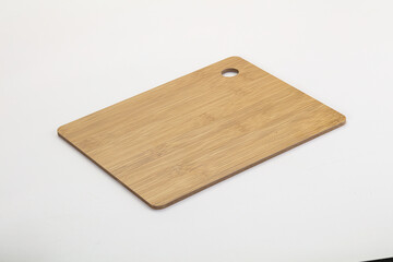 Wooden cutting board isolated on white background