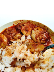Close-up of a Spoonful of Savory Jengkol Stew