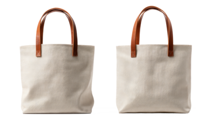 Two Beige Canvas Tote Bags with Brown Leather Handles on White Background