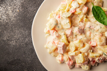 Potato salad ham, potato, tomato, carrot, mayonnaise tasty snack fresh delicious gourmet food background on the table rustic top view copy space