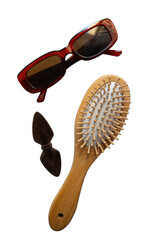 sunglasses and hair brush and hair clip