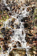 Waterfall, small water source on the slope of Lake Saint Maurice, in the Aigues Tortes National Park, Lleida	