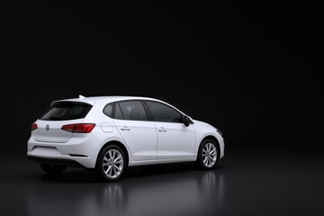 Fototapeta premium Sleek White Hatchback: Modern Design and Automotive Excellence on a Dark Reflective Surface