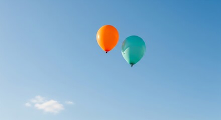 Obraz premium Floating High A Pair of Colorful Balloons in a Minimal Sky
