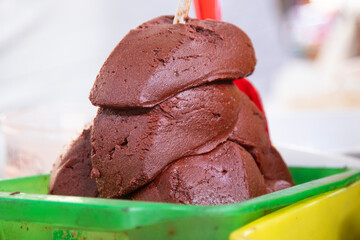 Stall selling varieties of fresh mole at the San Juan Market in Mexico City.