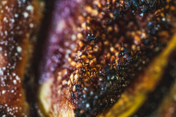 Background with the texture of baked figs, close-up. Macro photography. High quality photo