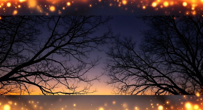 Dark silhouette of bare trees against a beautiful colorful twilight sky at sunset, with a golden glittering bokeh light frame, perfect for winter or Christmas projects