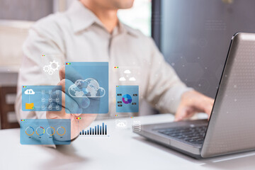 A person interacts with cloud-based data visualizations on a laptop, showcasing technology and digital analytics in a modern workspace.
