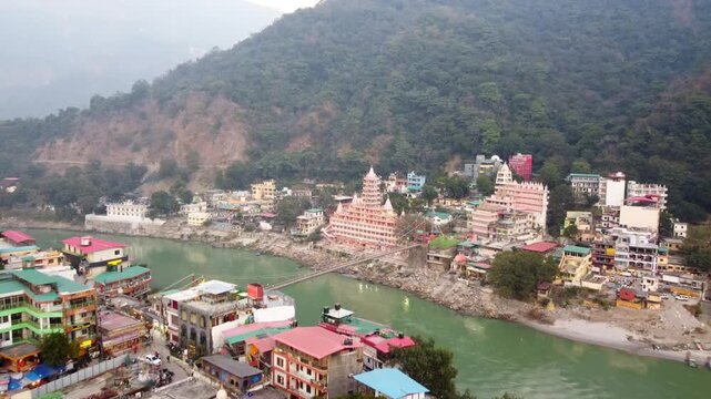 Rishikesh, Uttrakhand, India - October 10th 2024 - ​Trayambakeshwar Temple, also known as the Tera Manzil Temple. A vibrant architectural wonder on the banks of the Ganges River.