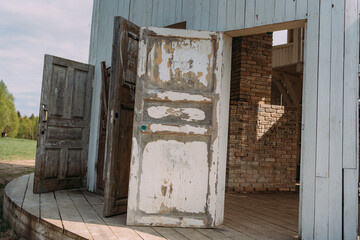 The doors of the Rotunda art object in the Nikola-Lenivets Art Park. White wooden doors