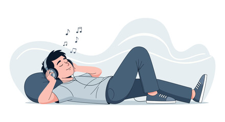Relaxing Young Man Reclining And Listening To Music With Headphones