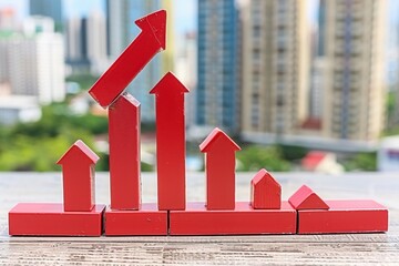 A collection of red upward arrows made from blocks symbolizes growth and progress against a city skyline backdrop.