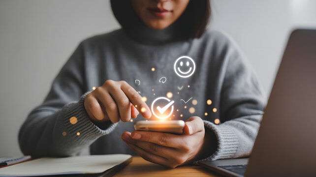 Digital Connection: A woman connects with technology on her smartphone and with floating, glowing icons showing customer satisfaction and feedback.