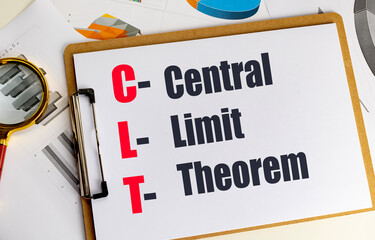 Clt acronym written on clipboard with financial documents, bar graphs, pie charts and magnifying glass on office desk