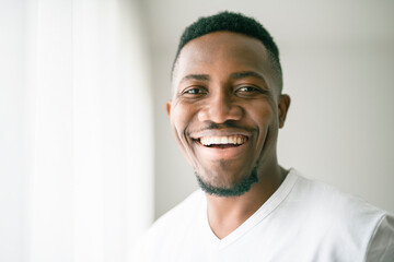 black man confident and casual at home. Portrait or headshot of a young men